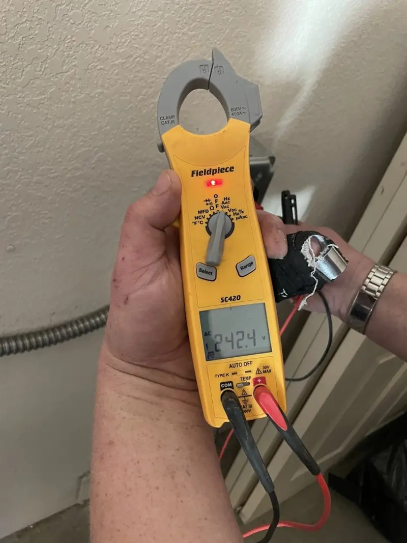 Voltage testing with clamp meter during Ceiling Fan Installation in Alondra Park